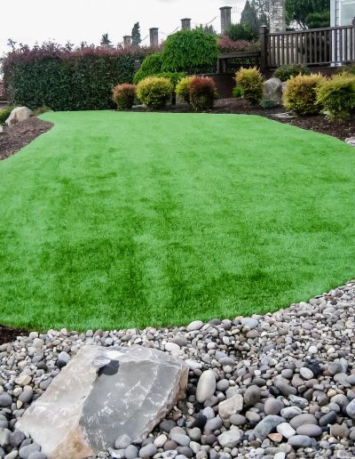 A Greenhaven Landscapes landscape maintenance customer's Vancouver WA back yard with lush green grass