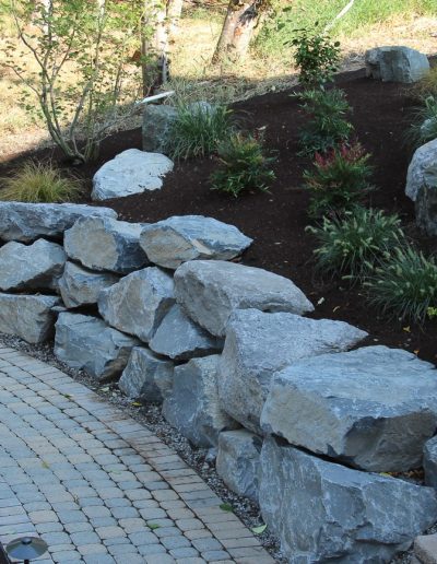 A Greenhaven Landscapes design customer's Vancouver WA rock wall and paver walkway and path