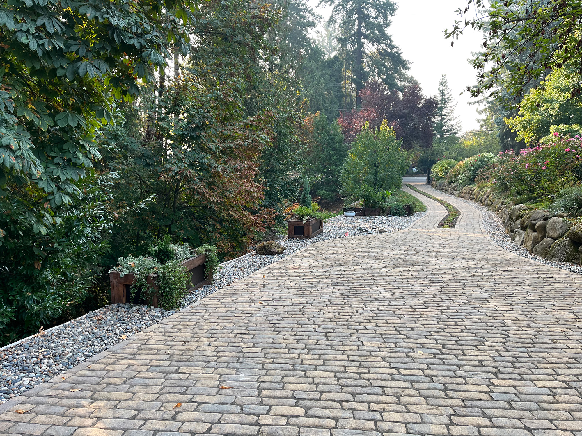 cobblestone driveway by Greenhaven Landscapes