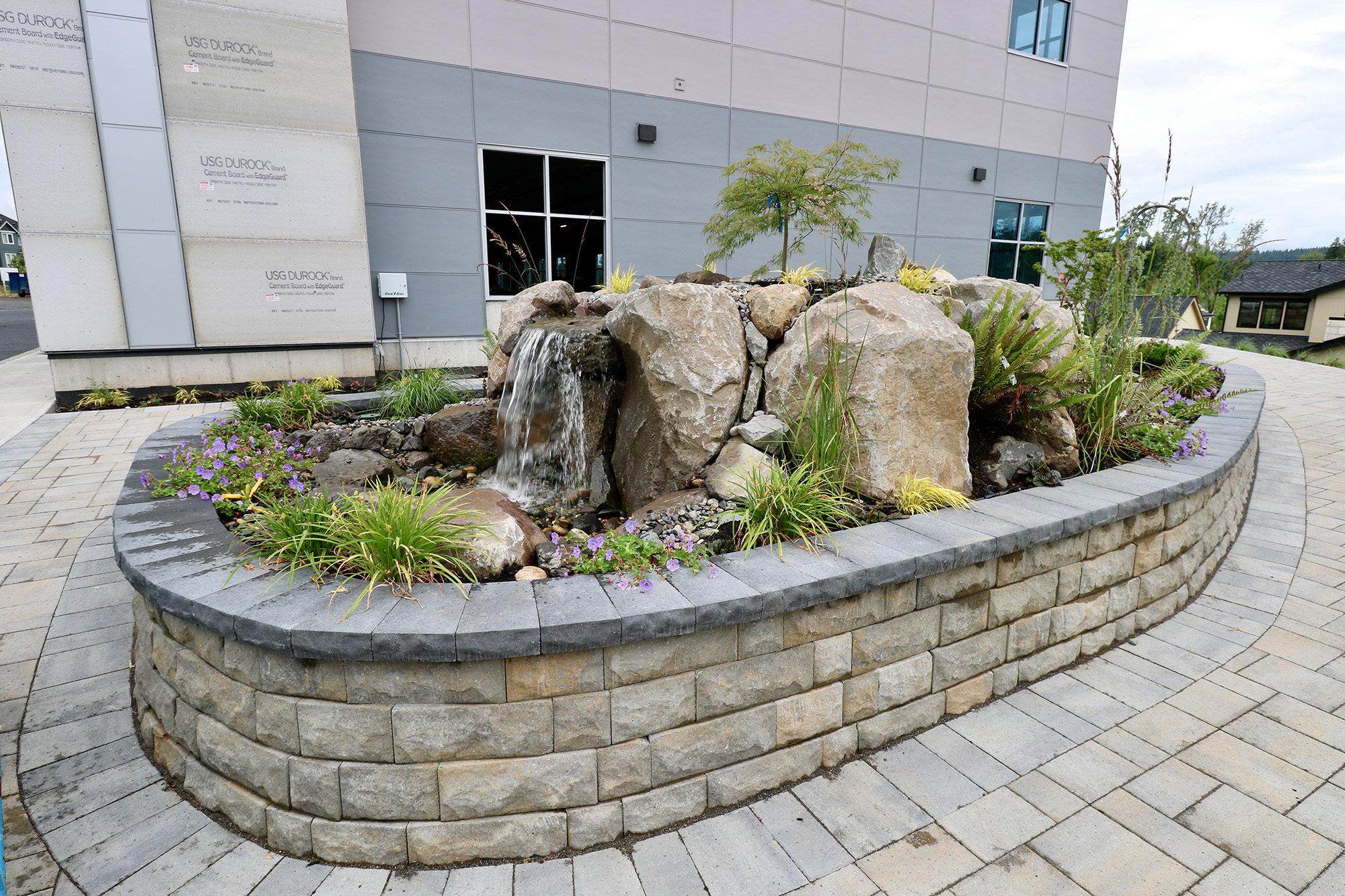 a water feature by Greenhaven Landscapes