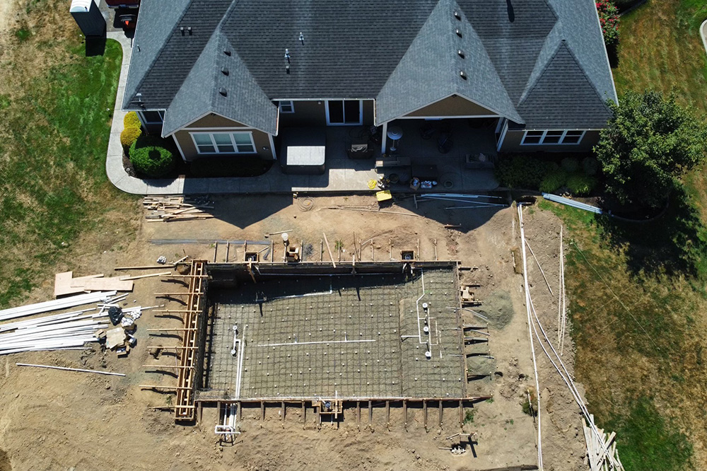 a pool by Greenhaven Landscapes in construction