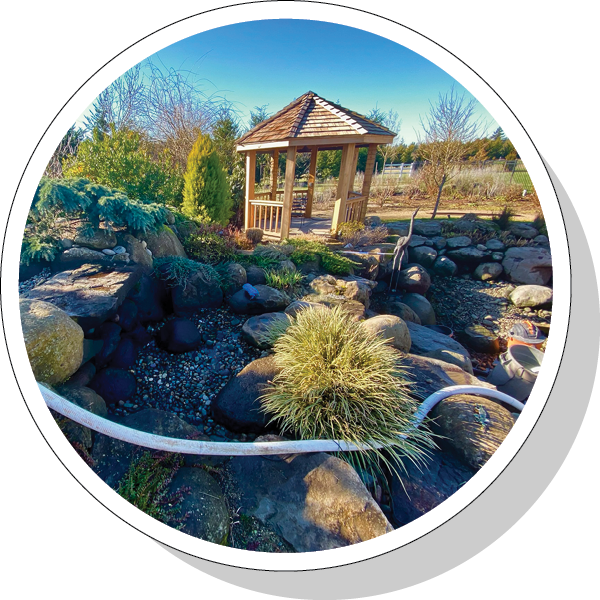 water feature with Greenhaven Landscapes cleaning and maintenance equipment