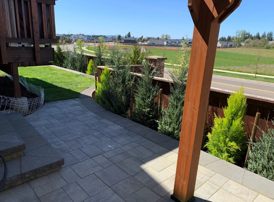 a patio and a retaining walls project by Greenhaven Landscapes