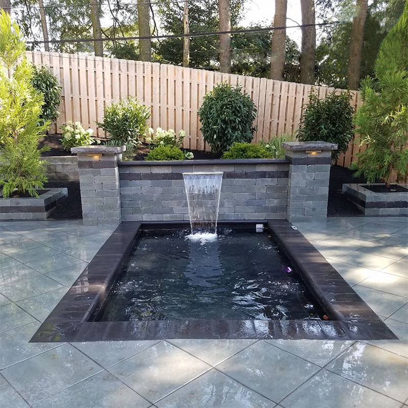 Immerspa Eternity inground spa with a waterfall feature